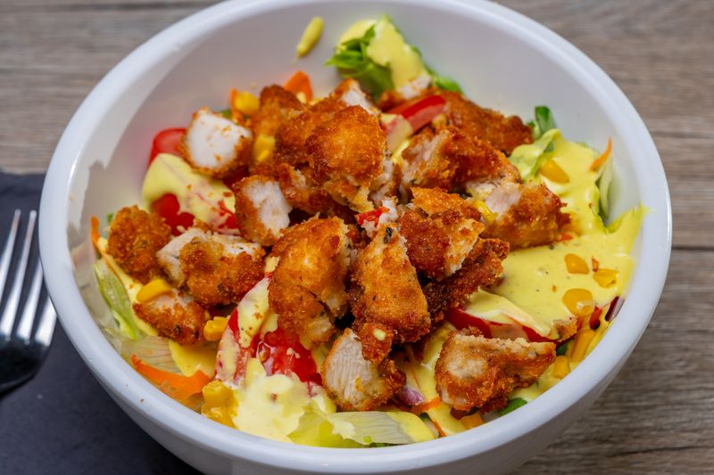 Grilled Chicken Avocado Salad with mixed greens